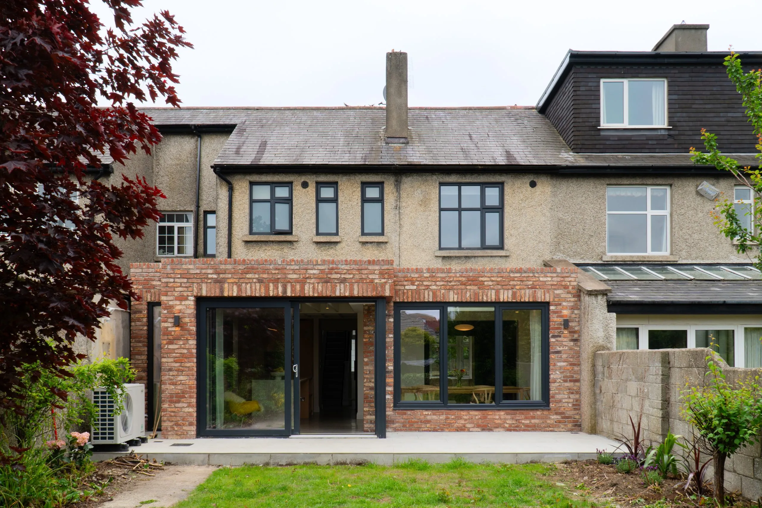 Churchtown 1900s house with modern red brick extension after renovation and retrofit