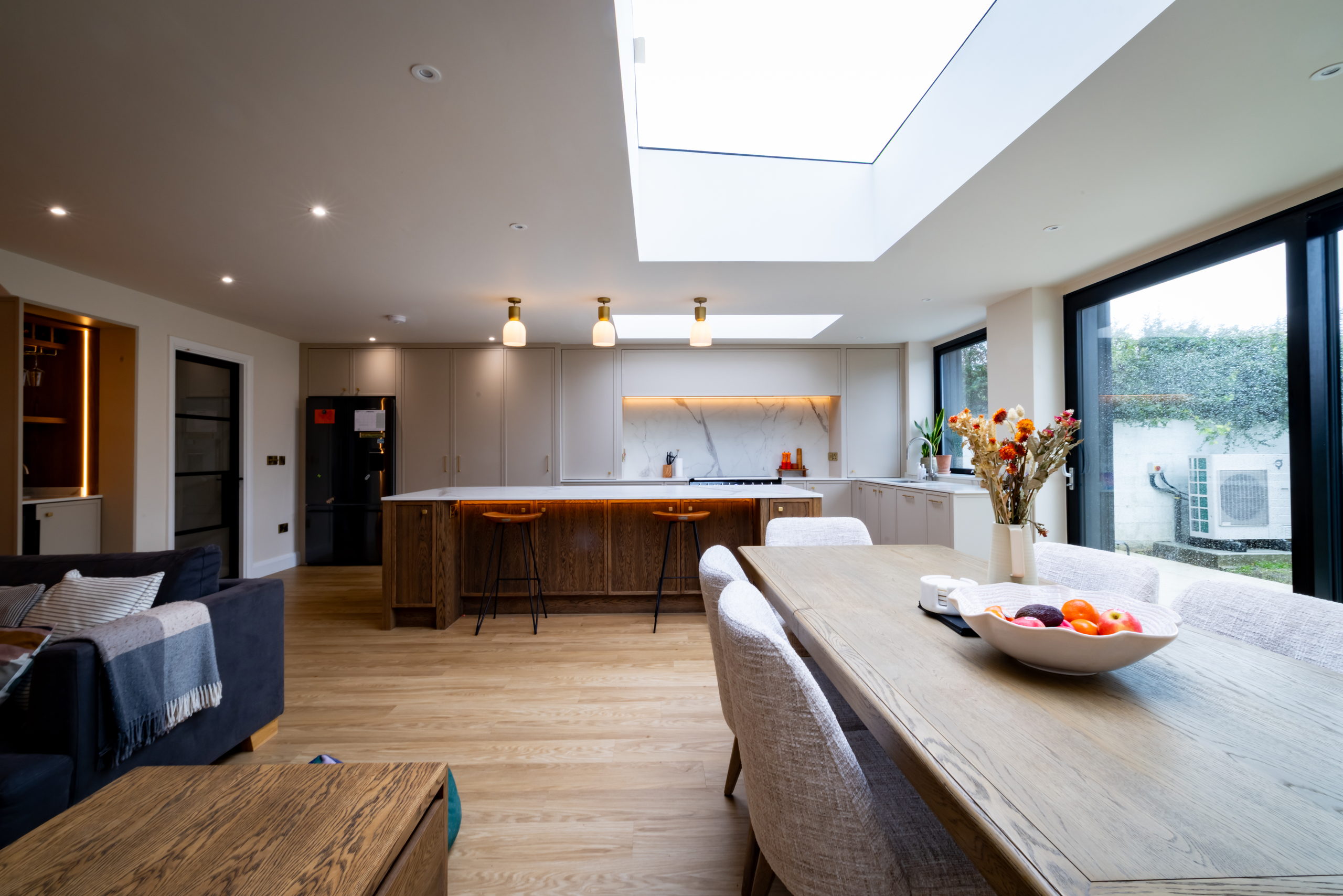 Open-plan kitchen and dining extension with skylights in a renovated 1950s Booterstown semi-detached home